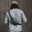 Filson Surveyor Crossbody Pack Service Green wearing a crossbody pack