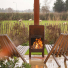 Weltevree Outdooroven in garden with Weltevree Fieldchairs