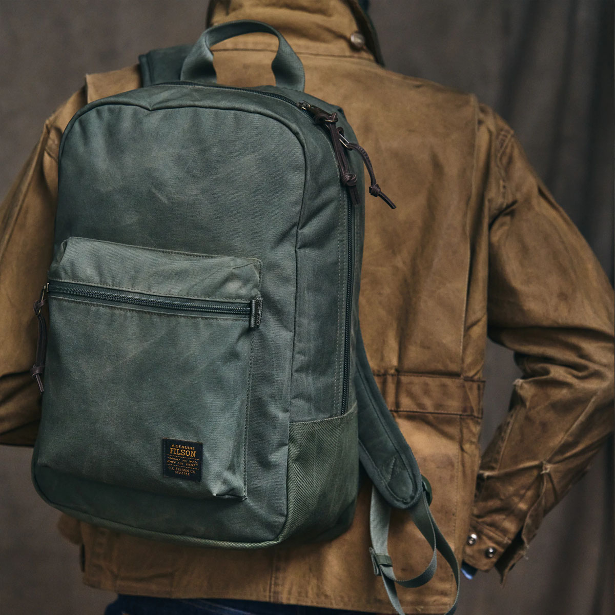 Filson Surveyor 25L Backpack Service Green, carried on the back