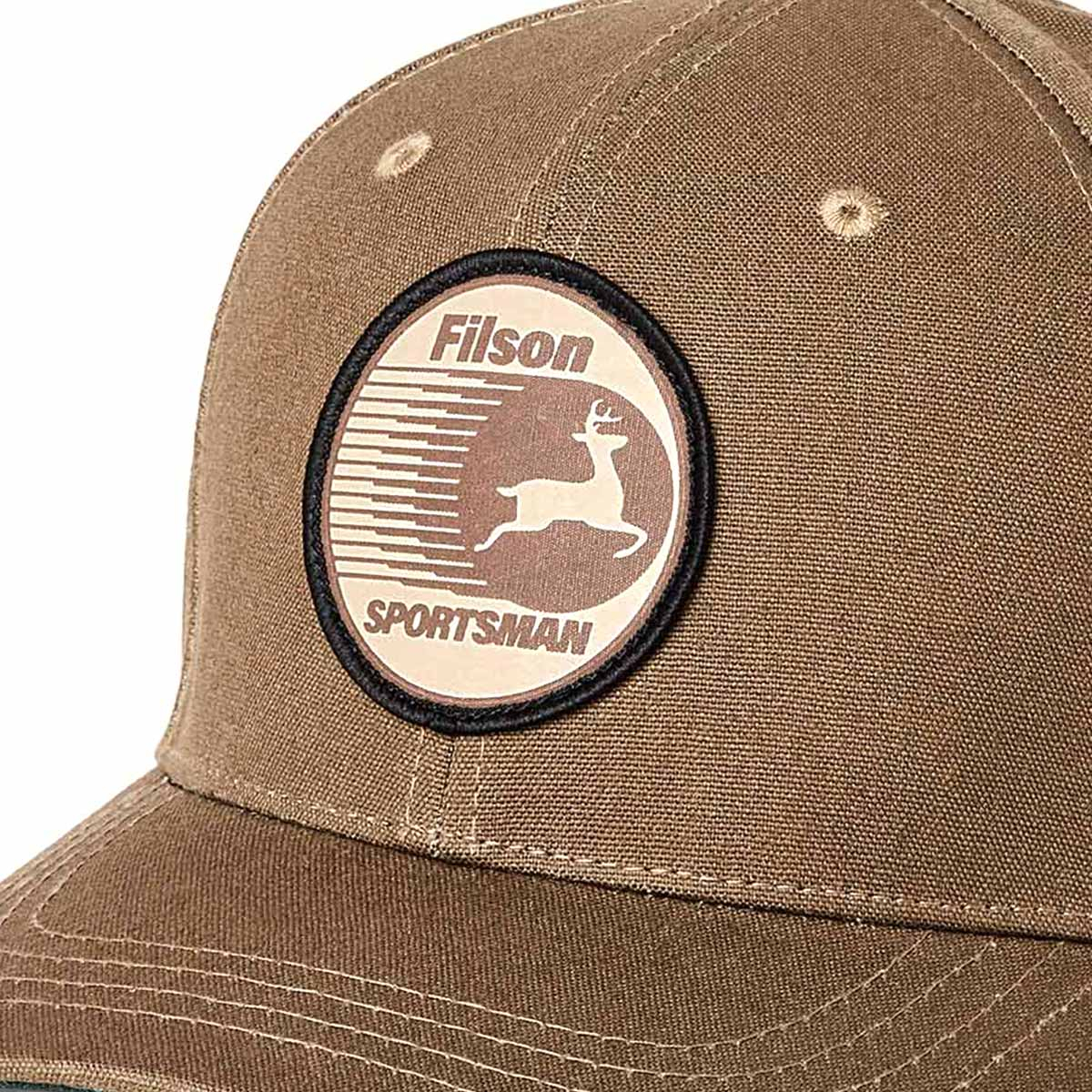 Filson Dry Tin Logger Cap Marsh Olive/Sportsman, a classic trucker-style cap made with sturdy canvas Tin Cloth