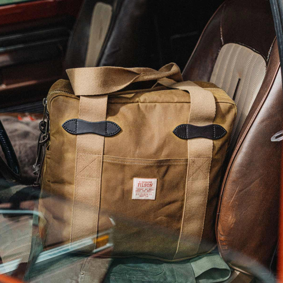 Filson Tin Cloth Tote Bag With Zipper Dark Tan, a classic-looking shopper designed for easy carrying of belongings